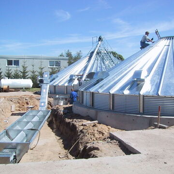 Gossen-TKF mit Bogen zur Oberflurabgabe auf den Elevator (keine Elevatorgrube)